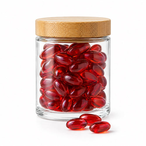 Bamboo lid glass jar filled with tart cherry softgels